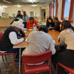 A group of students assisted senior citizens with a recently introduced "Word Search" activity.