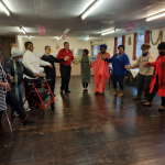 Older people dancing in harmony.