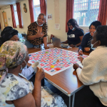 It is all laughter playing "Snakes and ladders" at the Day Centre.